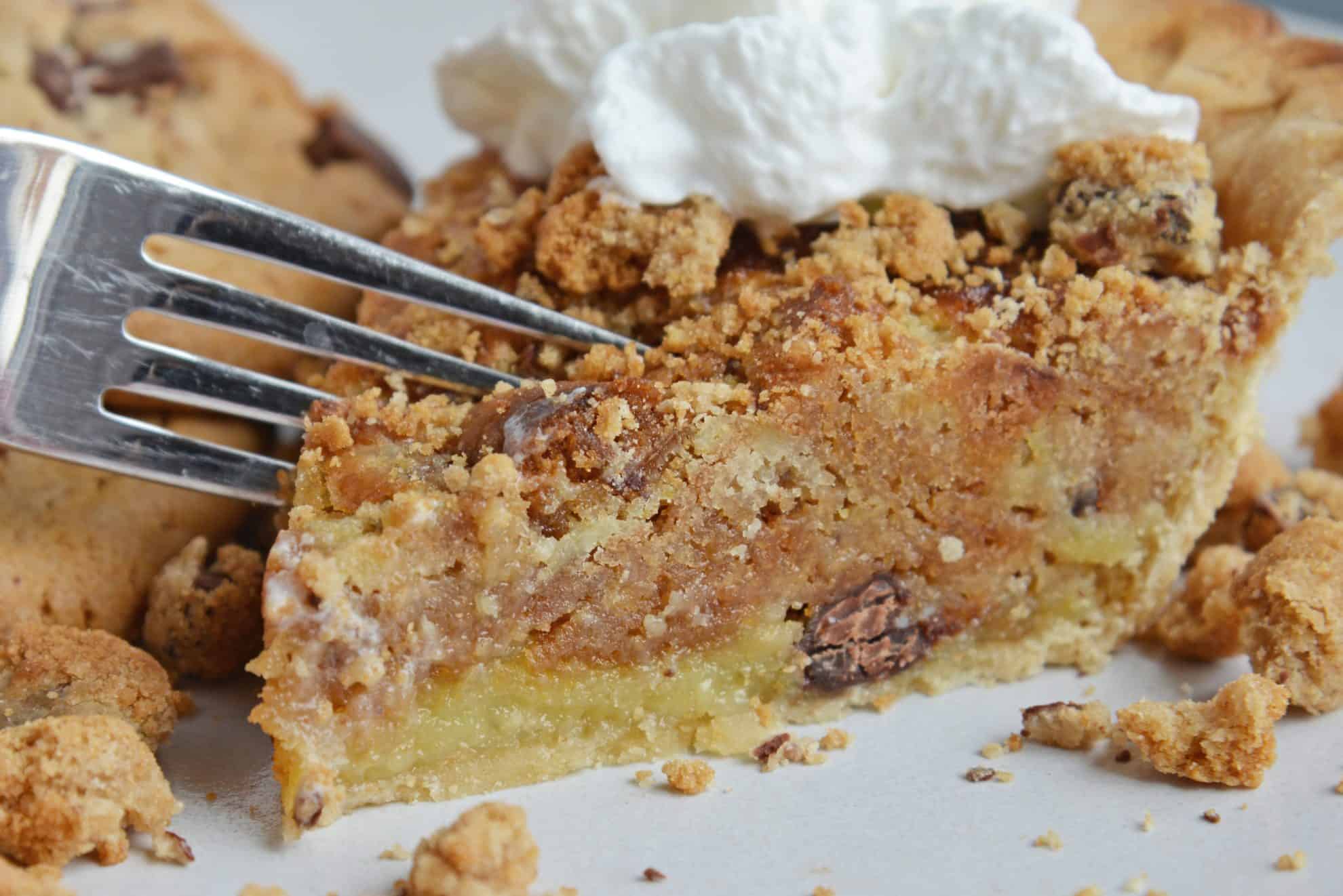 Fork cutting into a slice of chess pie