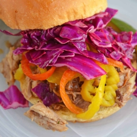 Close up of red cabbage slaw on sandwich