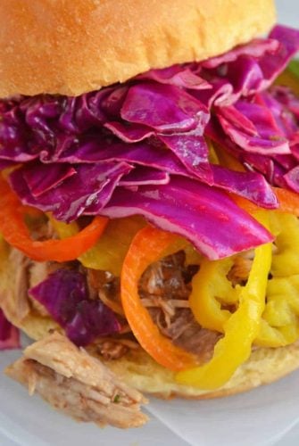 Close up of red cabbage slaw on sandwich
