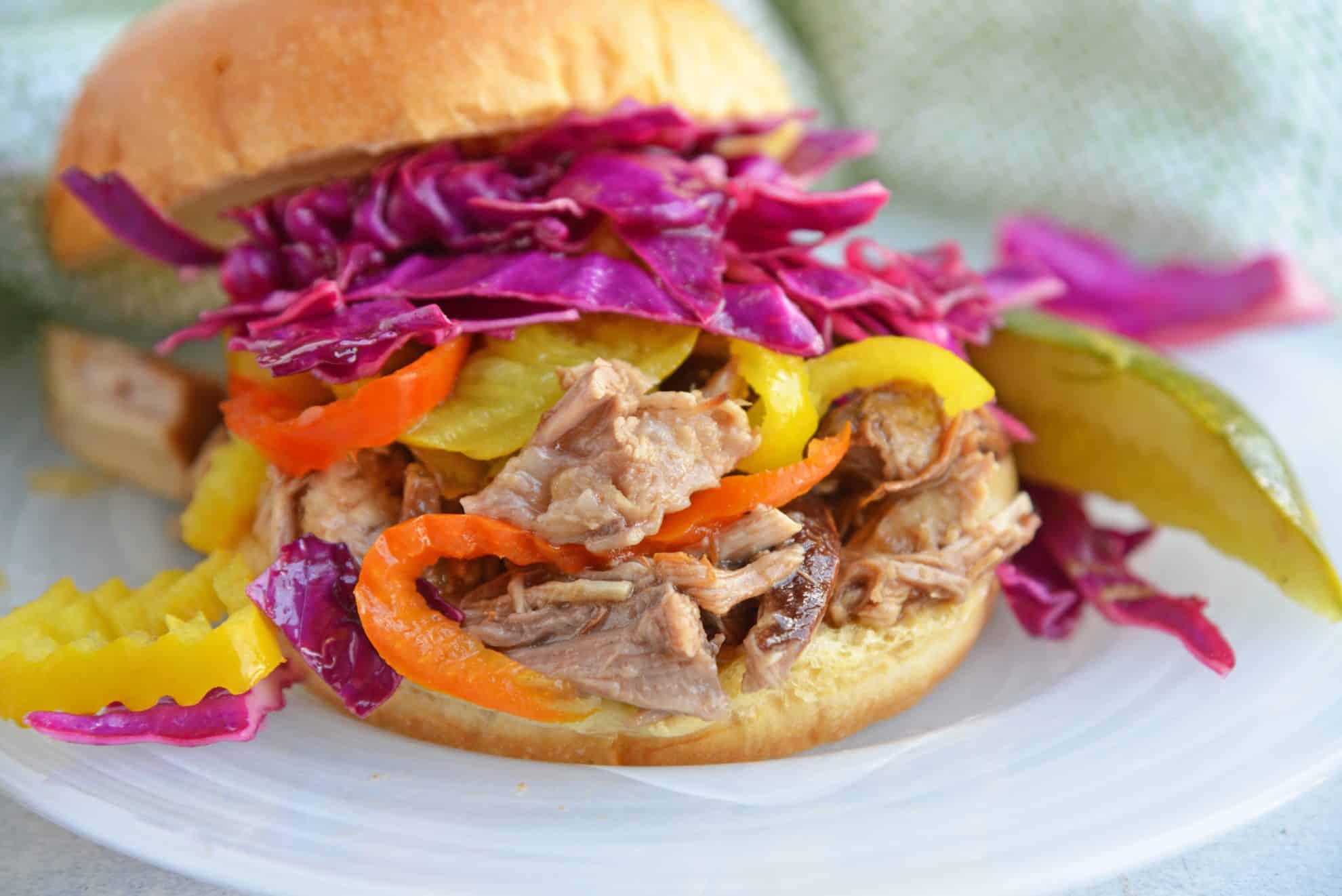Pulled Pork Sandwich with banana peppers and red cabbage slaw