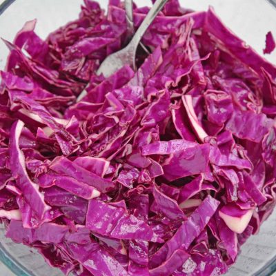 Bowl of shredded red cabbage slaw