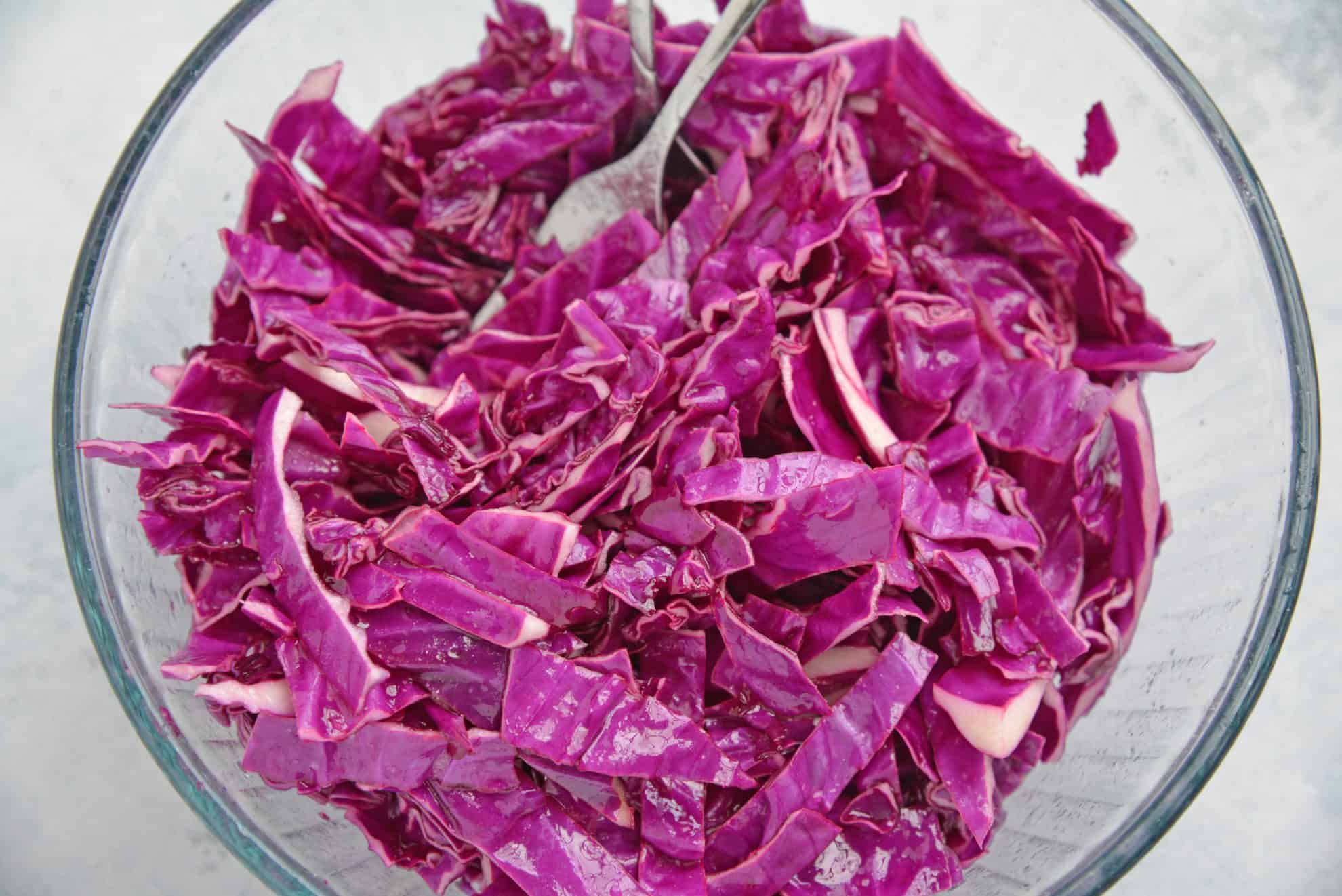 Bowl of shredded red cabbage slaw