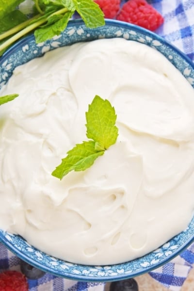 overhead of cream cheese fruit dip in blue bowl