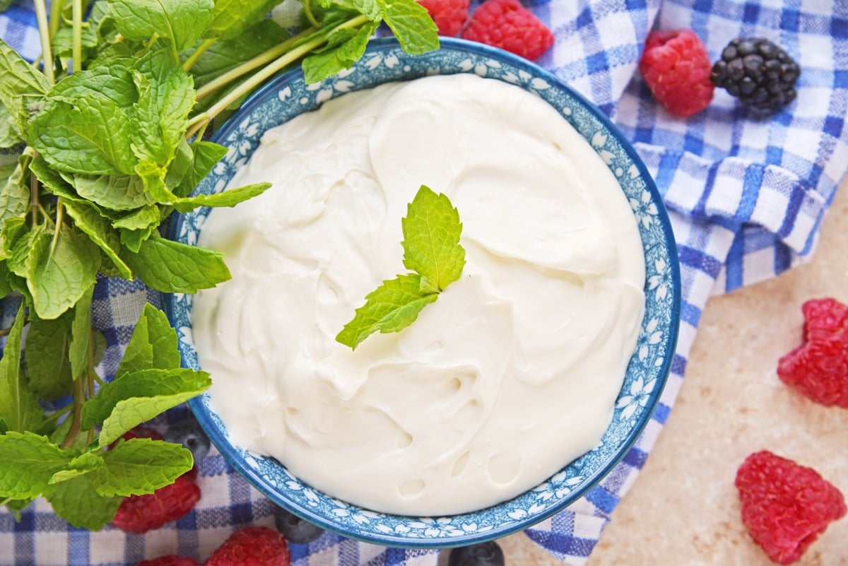 overhead of cream cheese fruit dip in blue bowl