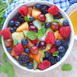 Overhead of fruit salad in white bowl