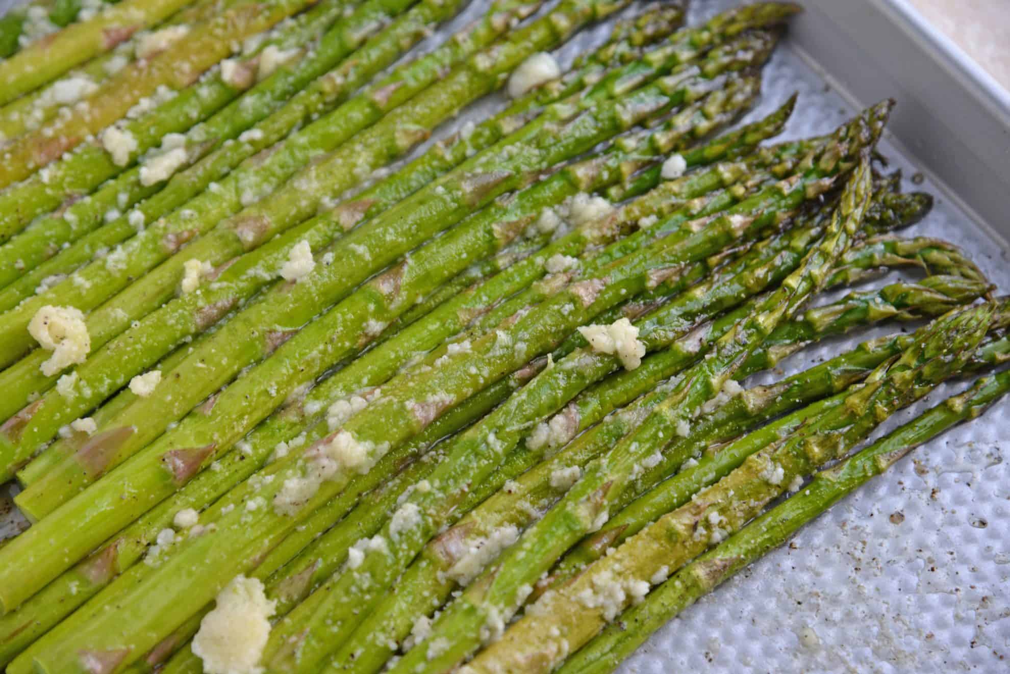 A close up of garlic parmesan asparagus 