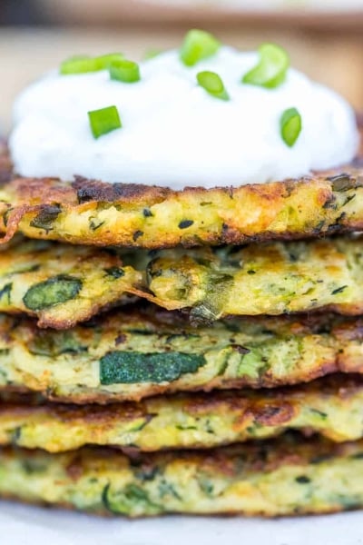 zucchini fritters with sour cream topping