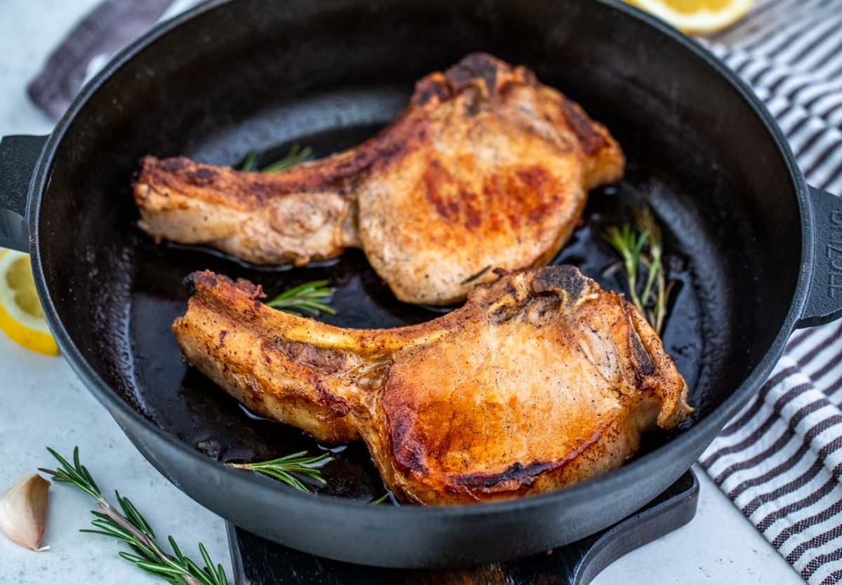 Pork chops in a cast iron pan 