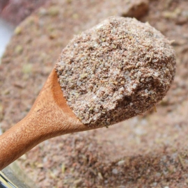 taco seasoning in a wooden spoon
