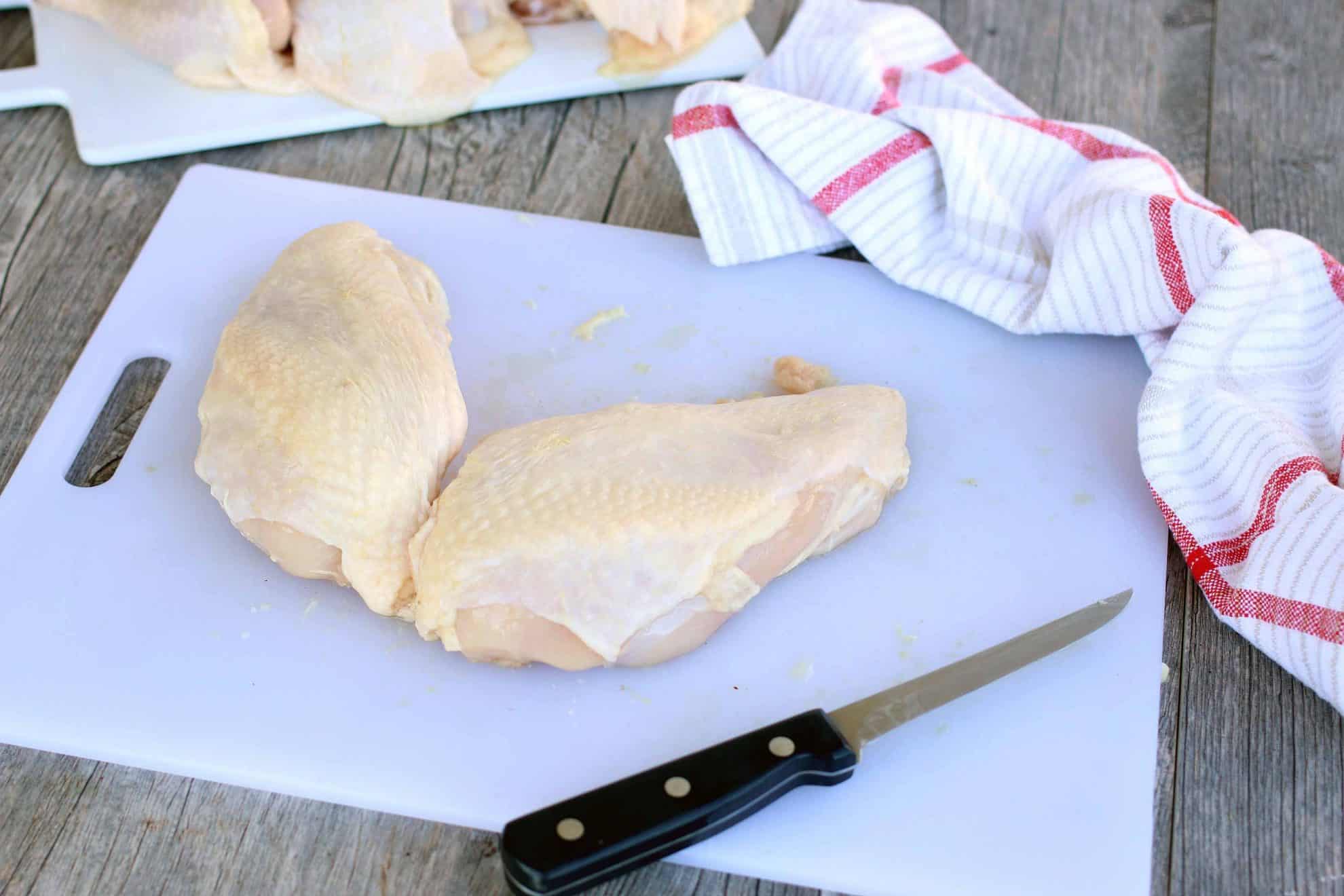 Chicken breasts on cutting board