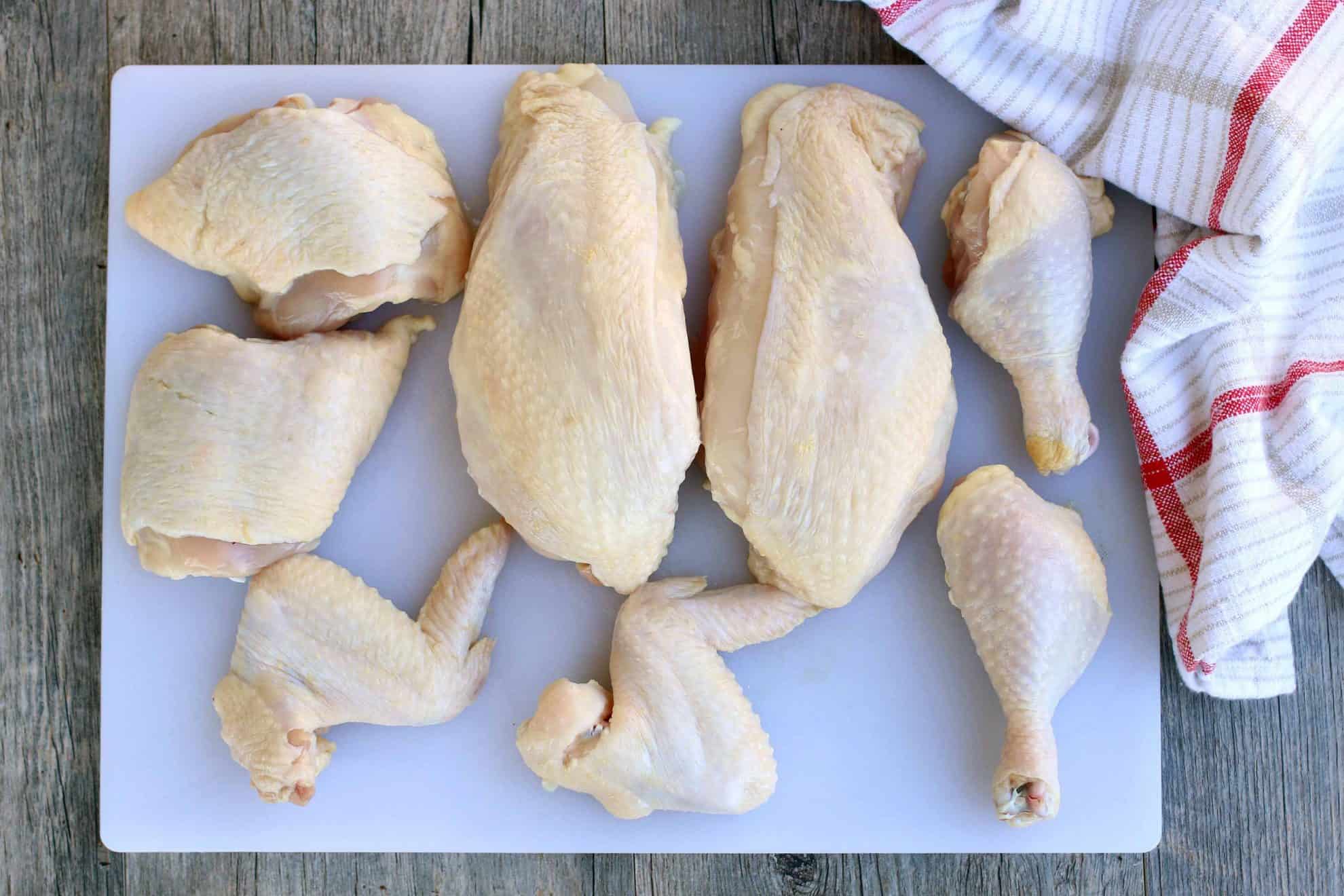 How to cut a whole chicken into individual cuts to save money.