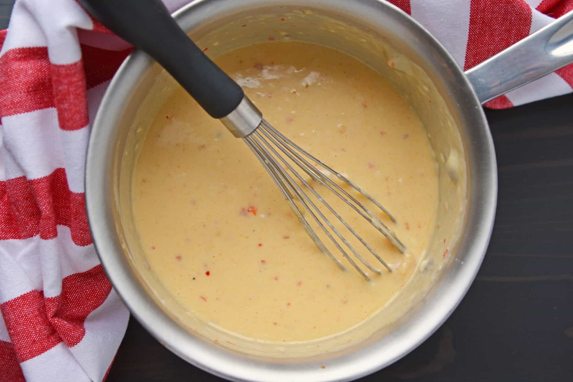 queso dip in a saucepan