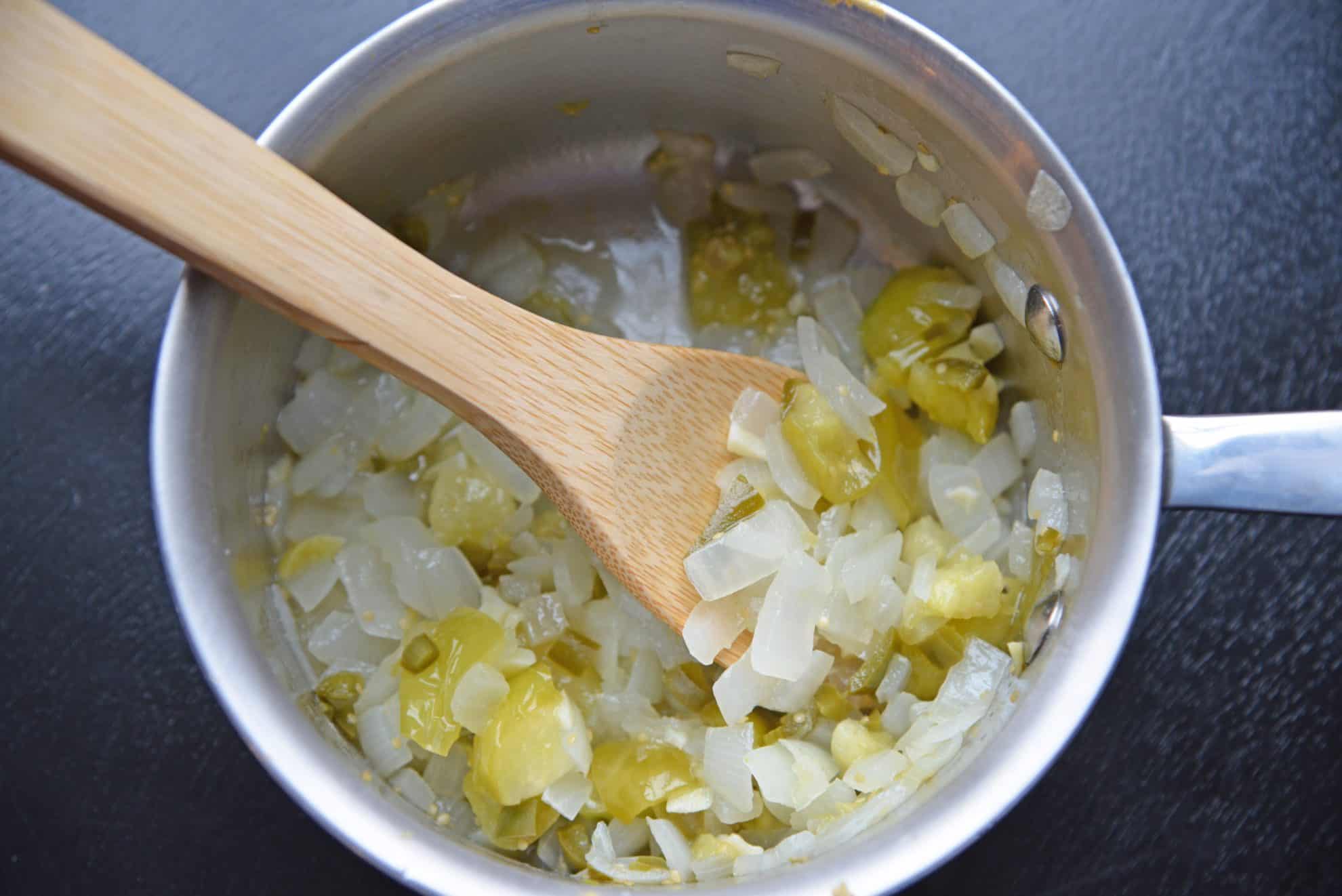 green enchilada sauce ingredients in a saucepan