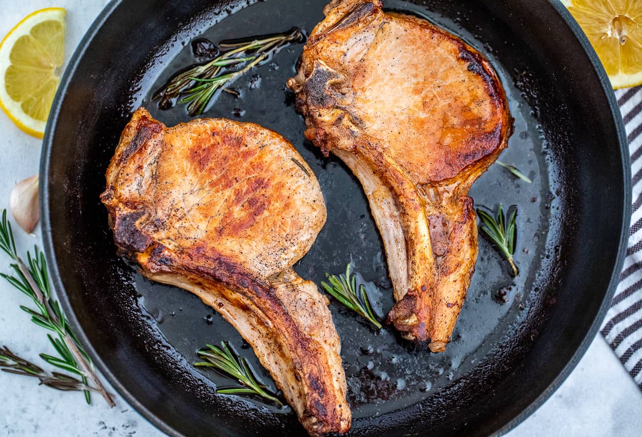 Pork chops in a cast iron skillet