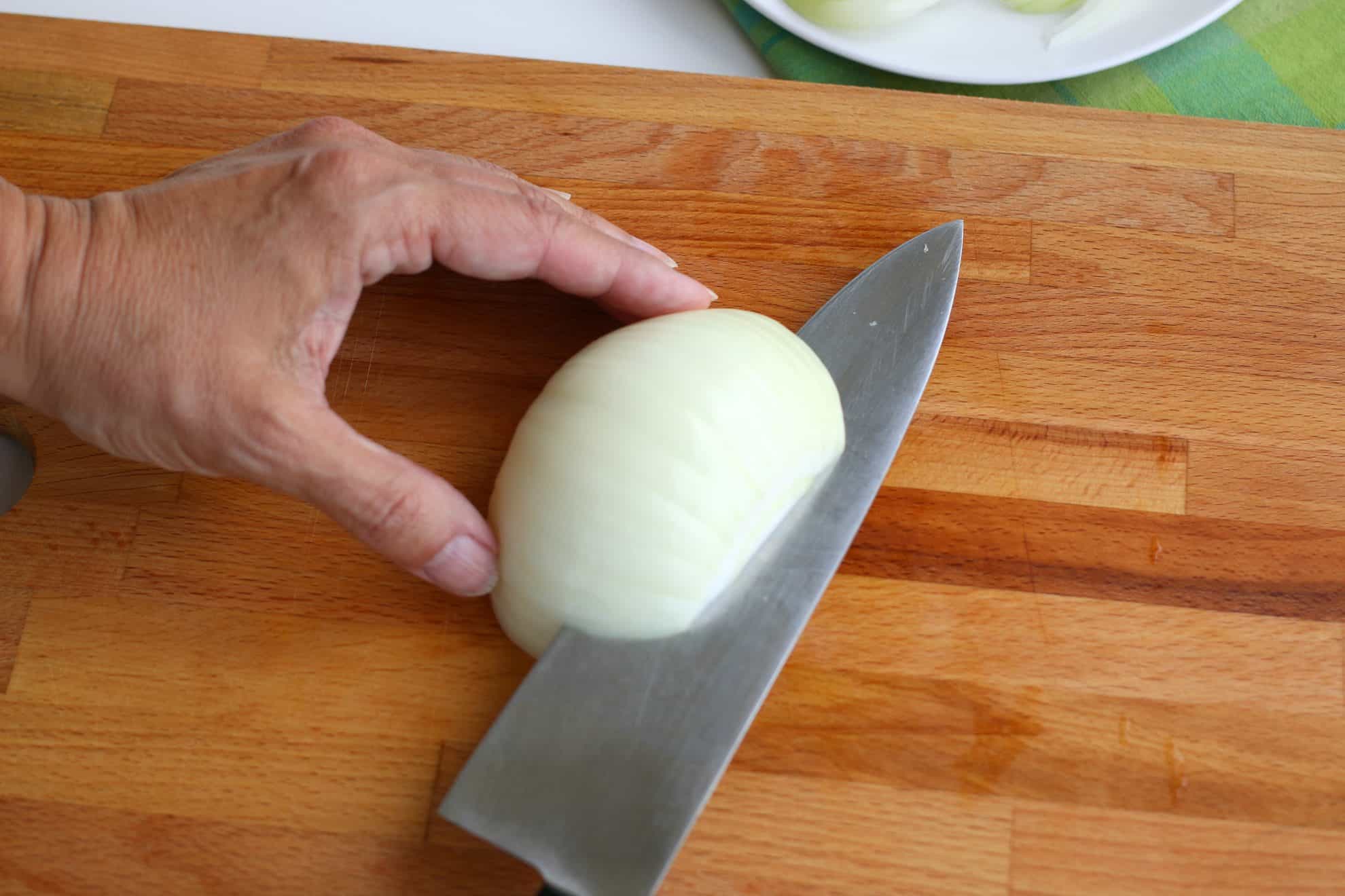 Slicing an onion to dice begins with horizontal cuts.