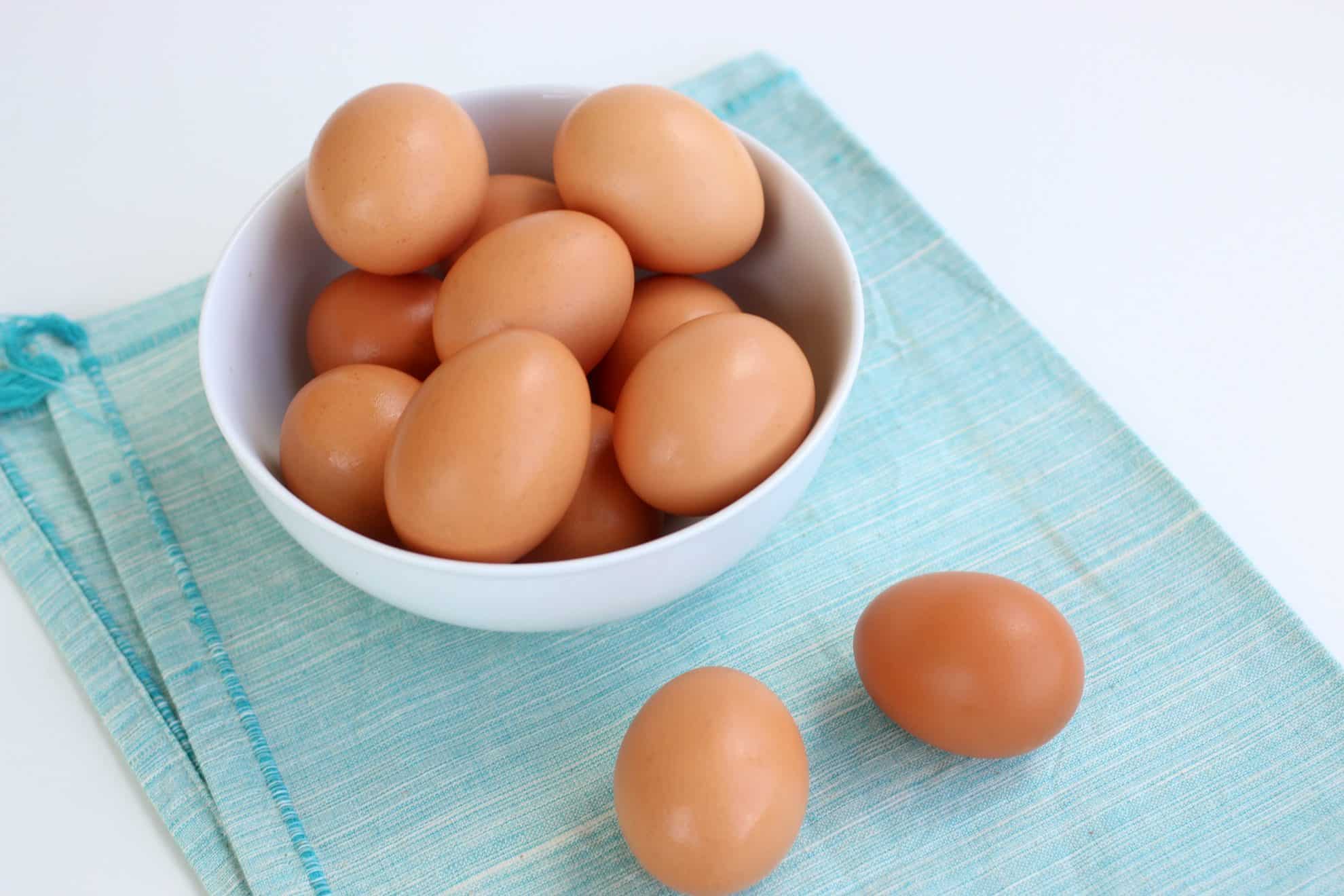 A bowl of eggs on a table