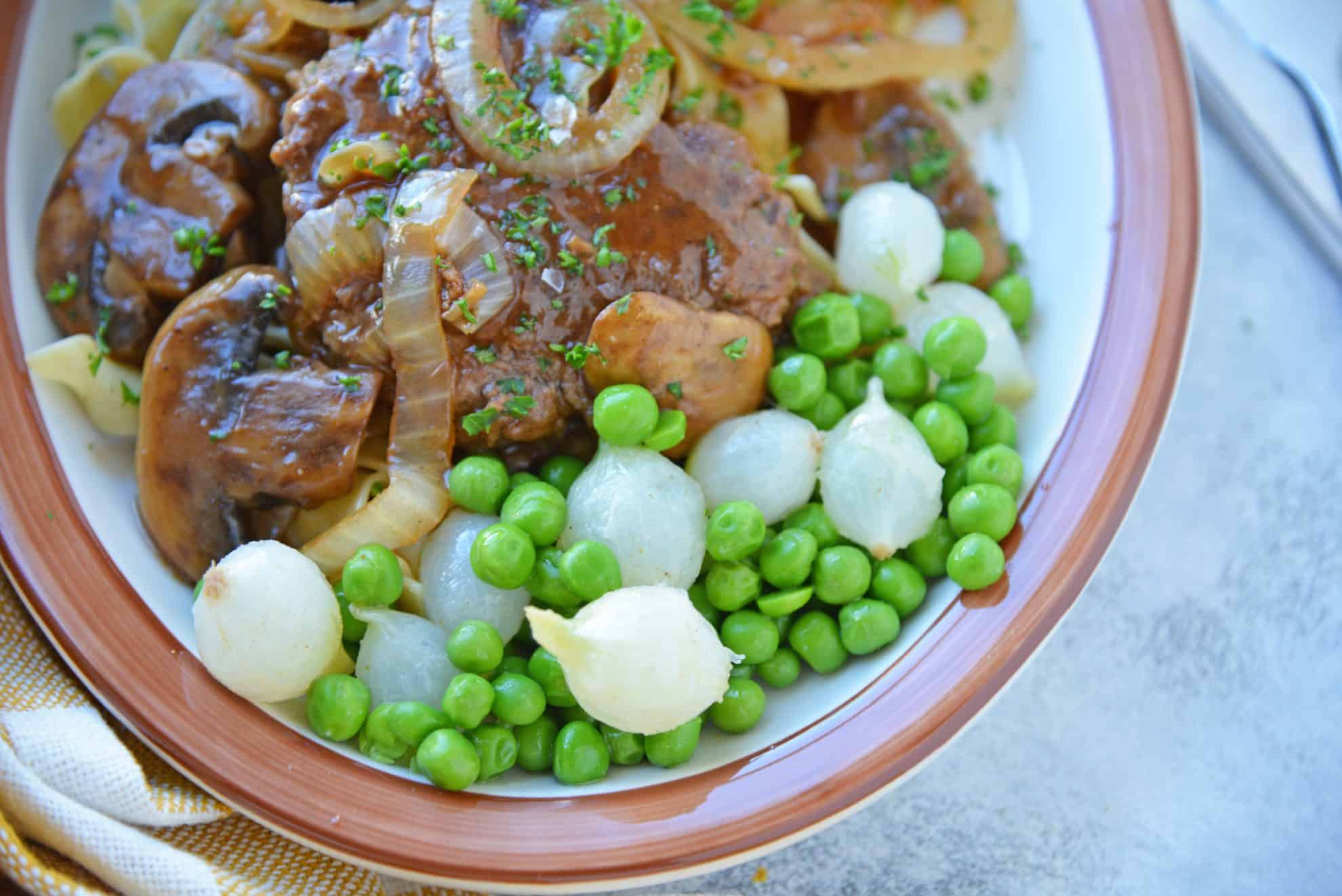 Peas and onions on a plate