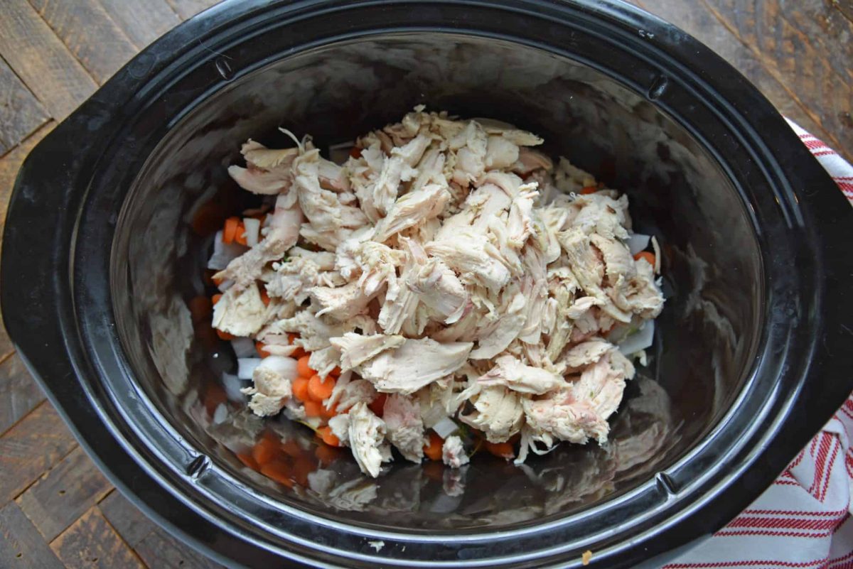 shredded chicken in a slow cooker