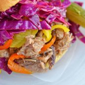 Close up of pulled pork sandwich with slaw