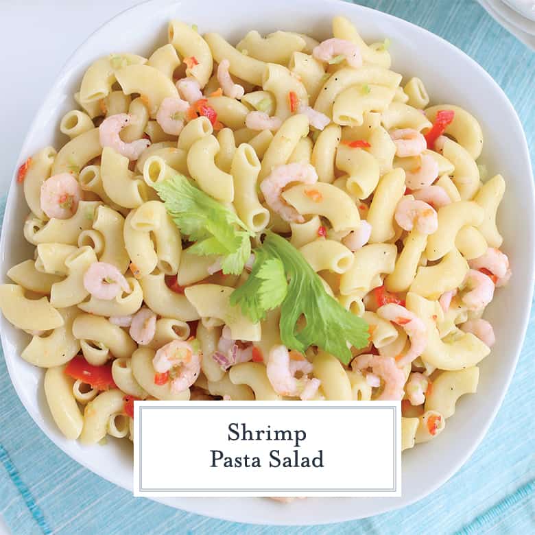 Shrimp pasta salad in a white serving bowl