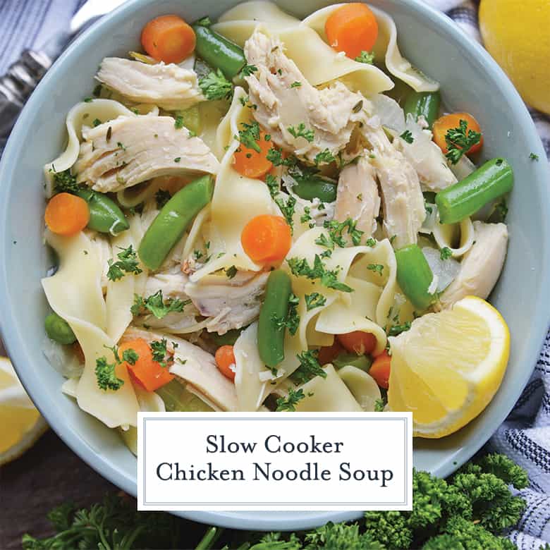 Overhead of chicken noodle soup in a light blue bowl