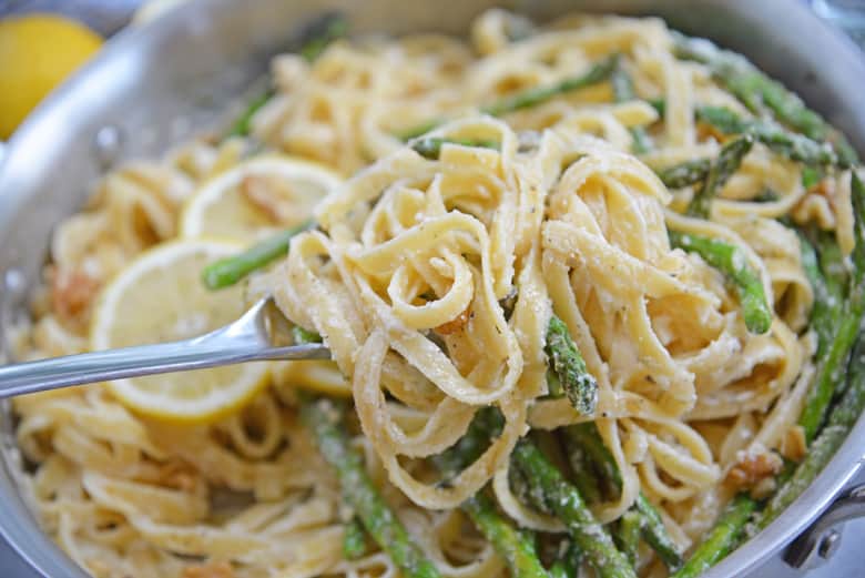 A bowl filled with pasta 
Cream and Sauce