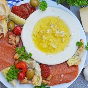 A plate of food on a table, with Bread