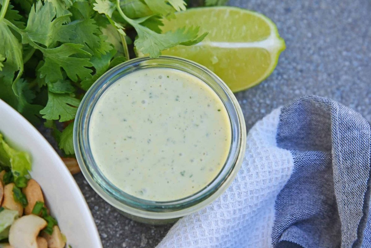 glass jar of green curry sauce