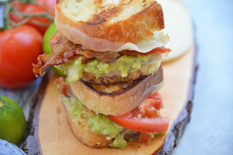 Angle view of a stacked guacamole grilled cheese sandwich 