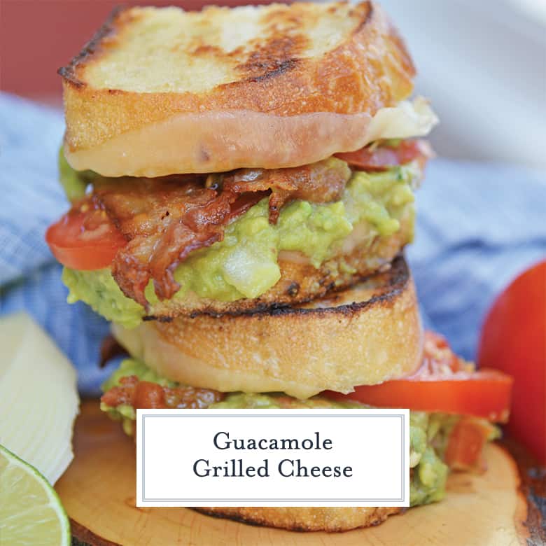 Guacamole grilled cheese sandwich layered with cheese, tomato and bacon 