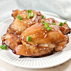 plate of sticky chicken thighs
