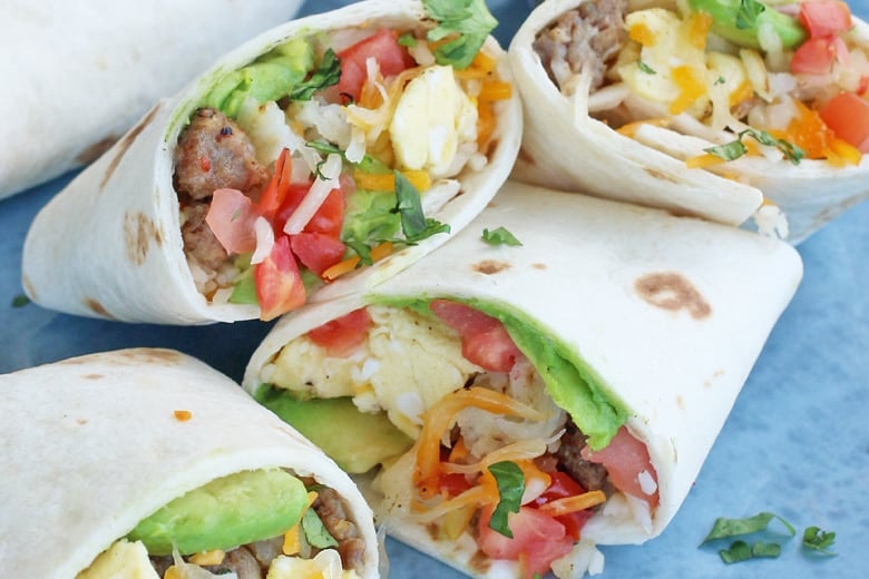 A close up of breakfast burrito