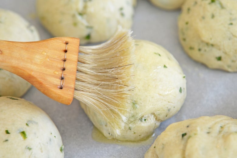 Butter basting Mexican cheese rolls 