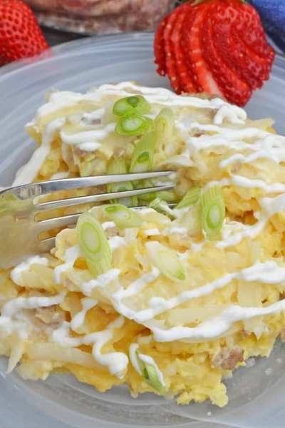 fork digging into breakfast casserole