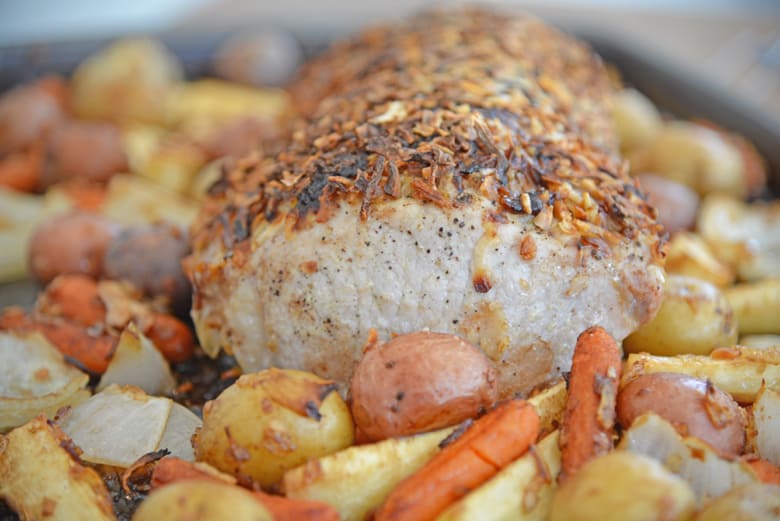 Side angle of French Onion Pork Loin on a baking sheet 