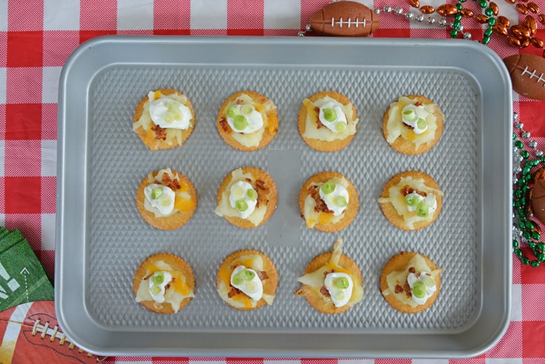 Overhead of RITZ cracker toppers on a baking sheet 