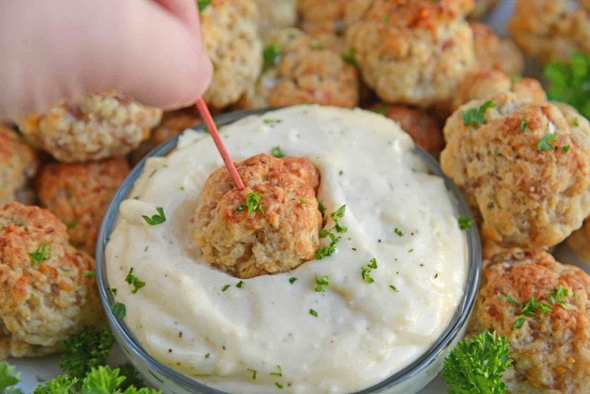 Easy sausage ball dipping into garlic aioli. 