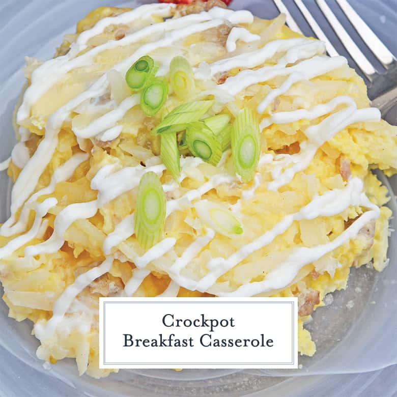 Close up of crockpot breakfast casserole with sour cream drizzle and scallions 