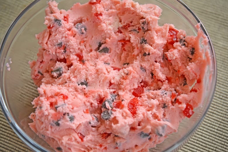 Cherry Chocolate Chip Cookie Dough in a glass mixing bowl 