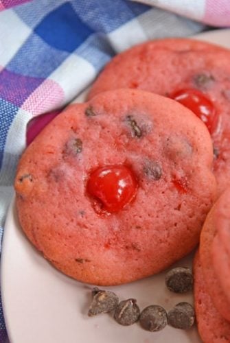 cherry chocolate chip cookies on a pink plate