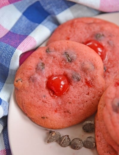 cherry chocolate chip cookies on a pink plate