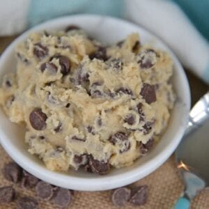 Chocolate chip cookie dough in a white bowl