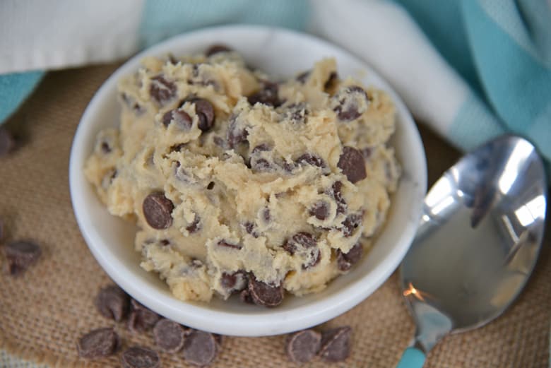 This Eggless Cherry Chocolate Cookie Dough recipe is the best single serve cookie dough recipe out there! It's safe to eat and oh so delicious! #ediblecookiedoughrecipe #singleservecookiedough #cookiedoughforone #egglesscookiedough www.savoryexperiments.com