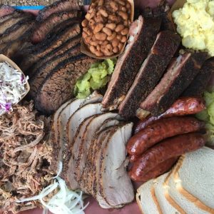 A pile of food on a plate, with Barbecue