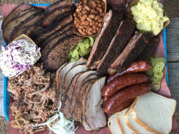 A pile of food on a plate, with Barbecue