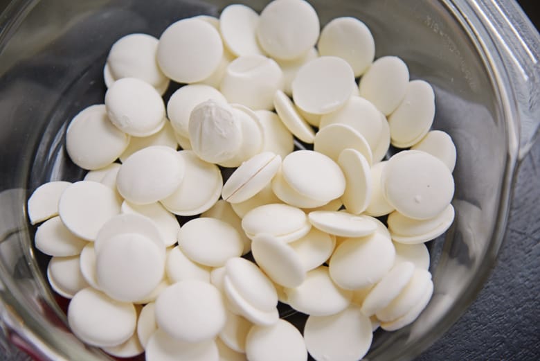 Bowl of white candy melts 