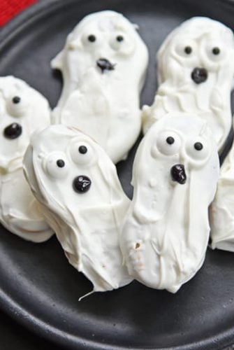 ghost Cookies on a black plate