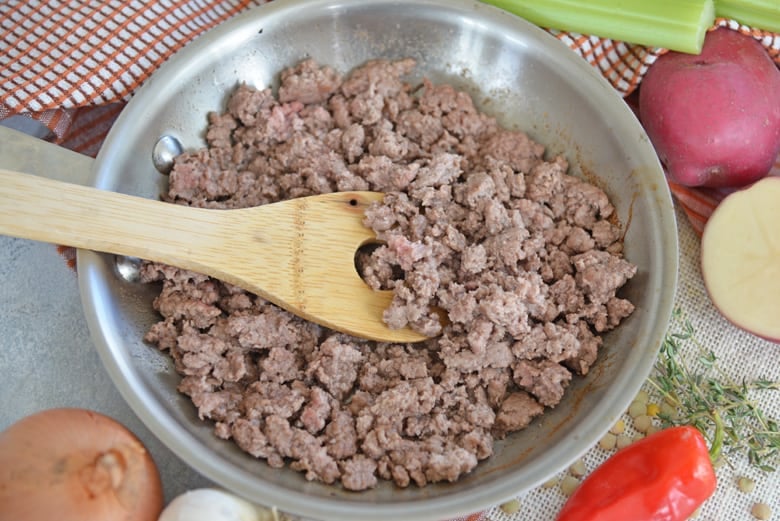 Ground lamb in a skillet 