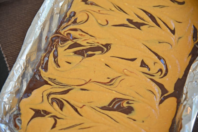 pumpkin swirled into brownie batter