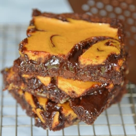 stack of pumpkin cheesecake brownies